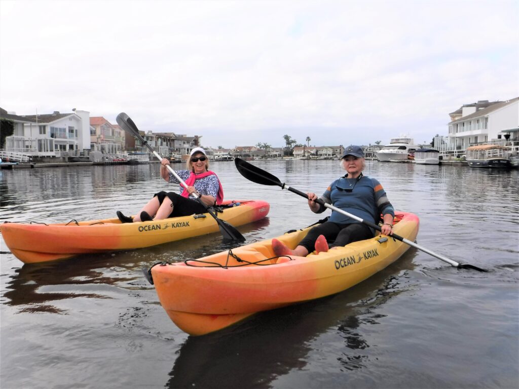 Two Stitch member kayaking together